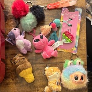9 pc Pink Alien, Pom Pom plush and pop it themed keychains in one lot